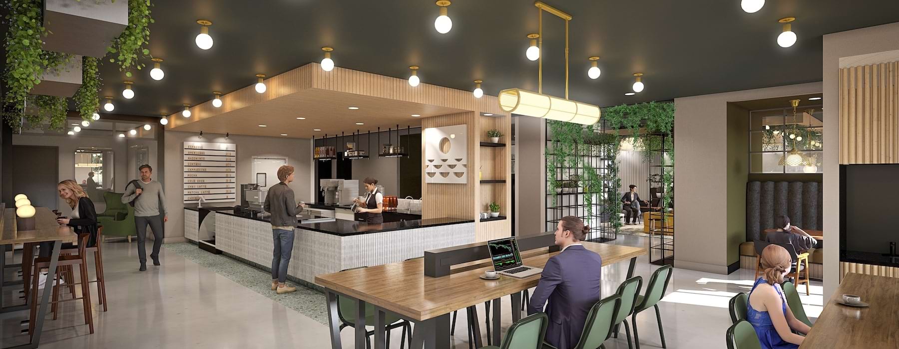 Residents lounge and co-working space at luxury apartments in LoSo Charlotte NC with modern seating, greenery, and social spaces
